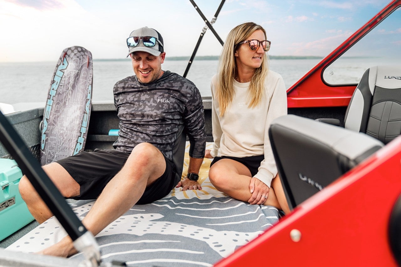 Parents on their HG 185 Lund Boat
