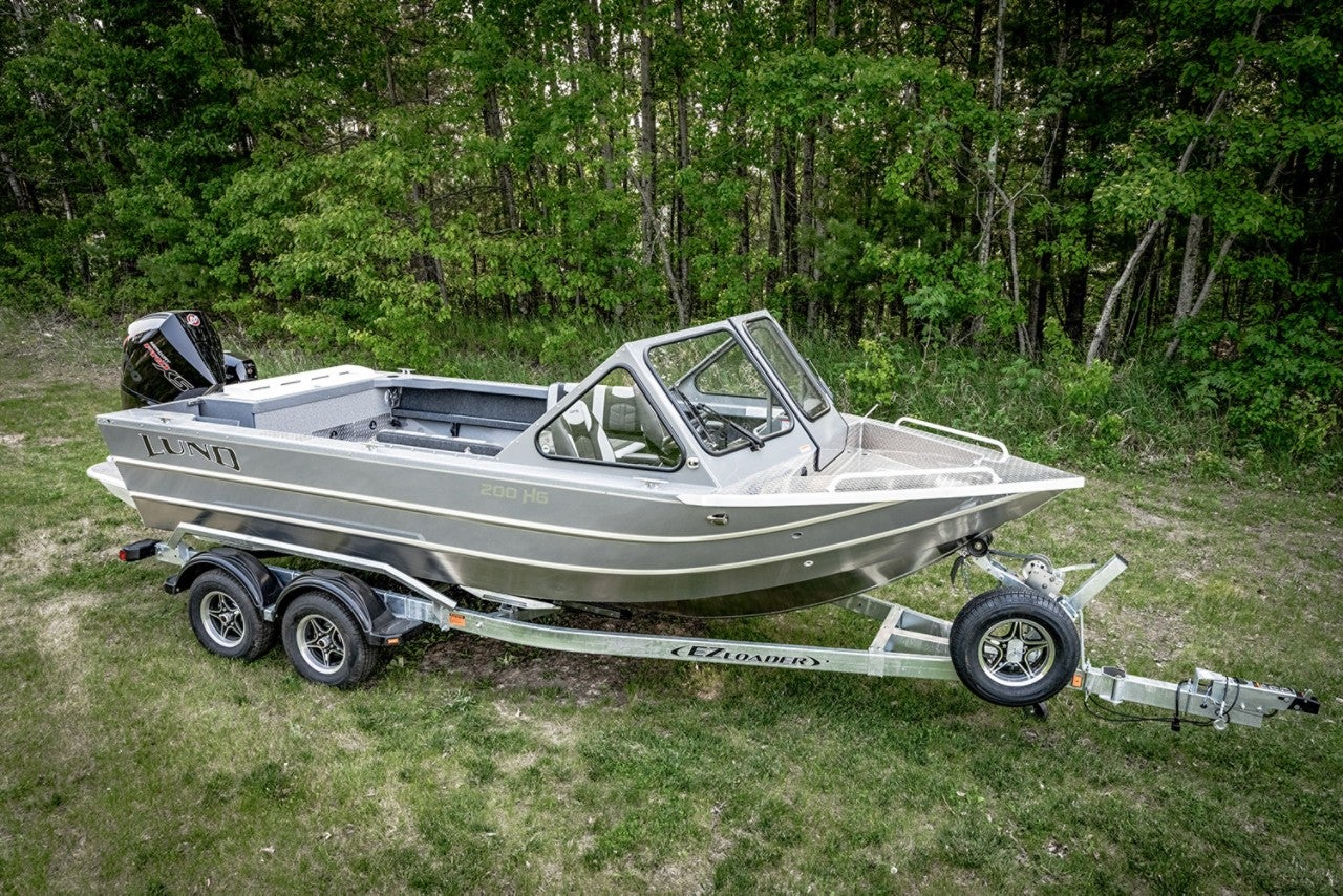 A HG 200 Lund boat on dry land trailered