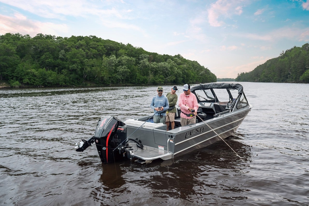 A group fishing off of their HG 200 Lund Boat