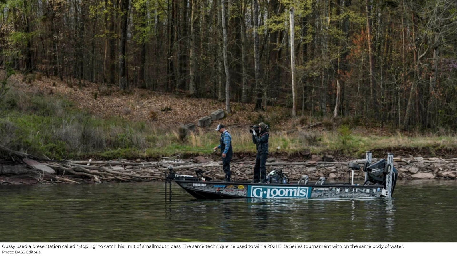 Jeff Gustafson standing in his Lund fishing boat