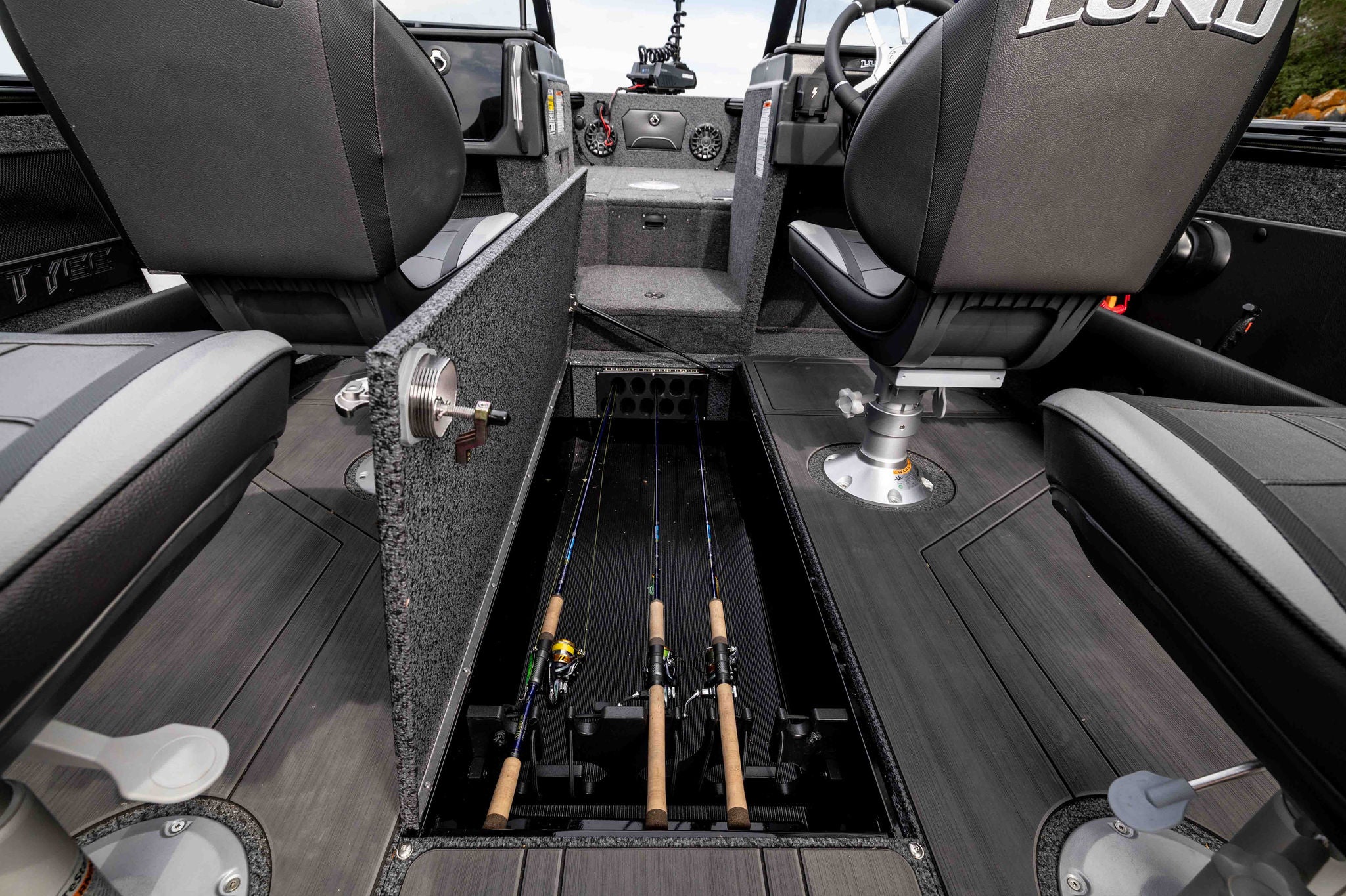 Fishing pole storage on a Lund 1975 Tyee