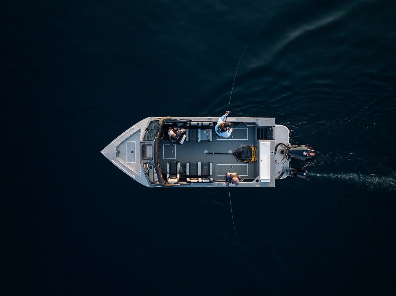An overhead view of a group fishing off of their HG 200 Lund Boat